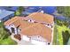 Two-story house with a two-car garage, lake view and spacious backyard at 2119 Kirkland Lake Dr, Auburndale, FL 33823