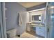 Bathroom boasts a vanity with granite countertop at 2119 Kirkland Lake Dr, Auburndale, FL 33823