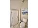 Simple toilet and storage in small bathroom at 2119 Kirkland Lake Dr, Auburndale, FL 33823