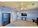Spacious bedroom with large TV, desk, and access to gym at 2119 Kirkland Lake Dr, Auburndale, FL 33823