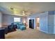 Versatile bedroom with a desk, couch, and access to a bathroom at 2119 Kirkland Lake Dr, Auburndale, FL 33823