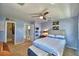 Spacious bedroom with ensuite bathroom access and ceiling fan at 2119 Kirkland Lake Dr, Auburndale, FL 33823