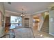 Elegant dining room with water views and kitchen access at 2119 Kirkland Lake Dr, Auburndale, FL 33823