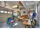 Well-equipped garage workshop with ample storage at 2119 Kirkland Lake Dr, Auburndale, FL 33823