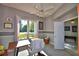 Bright home office features built-in desk and large window at 2119 Kirkland Lake Dr, Auburndale, FL 33823