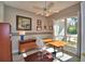 Spacious home office with wood desk and window view at 2119 Kirkland Lake Dr, Auburndale, FL 33823
