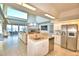Open concept kitchen with island and water view at 2119 Kirkland Lake Dr, Auburndale, FL 33823