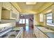 Kitchen with view of living room and water views at 2119 Kirkland Lake Dr, Auburndale, FL 33823
