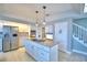 Large kitchen with stainless steel appliances and island at 2119 Kirkland Lake Dr, Auburndale, FL 33823