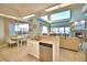 Open concept kitchen with breakfast nook and water view at 2119 Kirkland Lake Dr, Auburndale, FL 33823