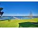 Serene view of the lake from the backyard at 2119 Kirkland Lake Dr, Auburndale, FL 33823