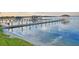 Peaceful lakefront view with a private dock and calm water at 2119 Kirkland Lake Dr, Auburndale, FL 33823
