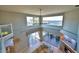 Spacious living area with high ceilings, water views, and a fireplace at 2119 Kirkland Lake Dr, Auburndale, FL 33823