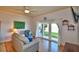 Living room with water views and sliding glass doors at 2119 Kirkland Lake Dr, Auburndale, FL 33823