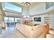 Spacious living room showcases a fireplace and stunning water views at 2119 Kirkland Lake Dr, Auburndale, FL 33823