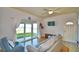 Living room with water views and sliding glass doors at 2119 Kirkland Lake Dr, Auburndale, FL 33823