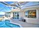 Poolside view with sliding glass doors to the kitchen at 2119 Kirkland Lake Dr, Auburndale, FL 33823