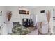 Cozy bedroom with sitting area and TV at 2500 21St Nw St # 22, Winter Haven, FL 33881