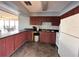 Well-equipped community kitchen with ample cabinetry at 2500 21St Nw St # 22, Winter Haven, FL 33881