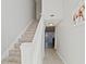 Inviting entryway with carpeted stairs and modern decor at 2500 21St Nw St # 22, Winter Haven, FL 33881