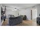 Living room with comfortable seating and wood-look floors at 2500 21St Nw St # 22, Winter Haven, FL 33881