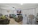 Open living room with a view, sliding doors, and lots of light at 2500 21St Nw St # 22, Winter Haven, FL 33881