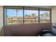 Screened-in patio with a view of the community and pool at 2500 21St Nw St # 22, Winter Haven, FL 33881