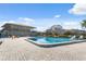 Inviting community pool area with lounge chairs at 2500 21St Nw St # 22, Winter Haven, FL 33881