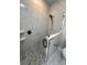 Bathroom features a glass shower and shower caddy shelves at 2510 Lakefront Dr, Lake Wales, FL 33898