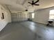 Spacious garage with high ceilings and ample room for storage at 2510 Lakefront Dr, Lake Wales, FL 33898
