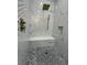 Modern walk-in shower with rainfall showerhead and mosaic tile accents at 2510 Lakefront Dr, Lake Wales, FL 33898