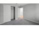 Bedroom featuring a closet with sliding doors, and a doorway at 264 Spirit Landings Cir, Winter Haven, FL 33880