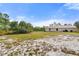 Expansive backyard offering plenty of space for outdoor activities and potential landscaping projects at 2772 Indian Pipes Trl, Frostproof, FL 33843