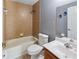 Bathroom features tile floors, shower-over-tub combination, and spacious vanity at 2772 Indian Pipes Trl, Frostproof, FL 33843