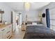 Charming bedroom with tile floors, neutral walls, and direct bathroom access at 2772 Indian Pipes Trl, Frostproof, FL 33843