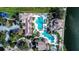 Community pool, clubhouse, and parking area at 3526 Valleyview Dr, Kissimmee, FL 34746