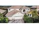 Luxury home with a large driveway and beautiful landscaping at 3526 Valleyview Dr, Kissimmee, FL 34746