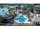 Community pool and clubhouse with lake view at 3526 Valleyview Dr, Kissimmee, FL 34746