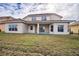 Two-story house with covered patio and spacious backyard at 3526 Valleyview Dr, Kissimmee, FL 34746