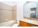 Clean bathroom with tub, vanity and mirror at 3526 Valleyview Dr, Kissimmee, FL 34746
