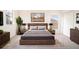 Spacious bedroom with wood bed frame and plenty of natural light at 3526 Valleyview Dr, Kissimmee, FL 34746
