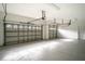 Spacious two-car garage with white walls at 3526 Valleyview Dr, Kissimmee, FL 34746