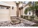 Tan house exterior with a paved walkway and garage at 3526 Valleyview Dr, Kissimmee, FL 34746