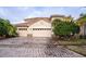 Two-story house with tile roof and double garage at 3526 Valleyview Dr, Kissimmee, FL 34746