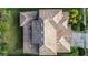 Aerial view of a house with a clay tile roof at 3526 Valleyview Dr, Kissimmee, FL 34746