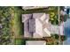 Aerial view of a house with a clay tile roof at 3526 Valleyview Dr, Kissimmee, FL 34746