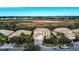 Aerial view of a luxury home in a quiet neighborhood at 3526 Valleyview Dr, Kissimmee, FL 34746