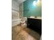 Bathroom featuring a shower/tub combo, a vanity with storage, and tile flooring at 3710 Black Jack Ct, Lake Wales, FL 33898
