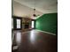 Spacious living room with stone fireplace and views to the outdoors at 3710 Black Jack Ct, Lake Wales, FL 33898