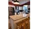 Modern kitchen island with granite countertop and seating at 4105 Oak Dr, Winter Haven, FL 33881